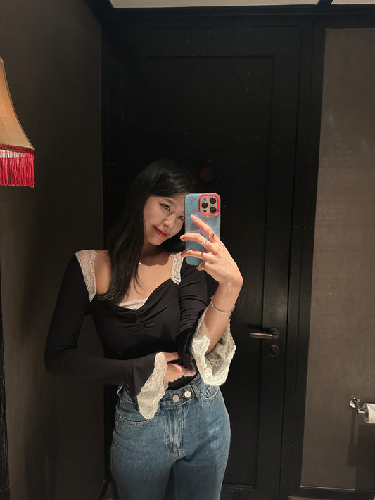 Black and white lace top with flared sleeves