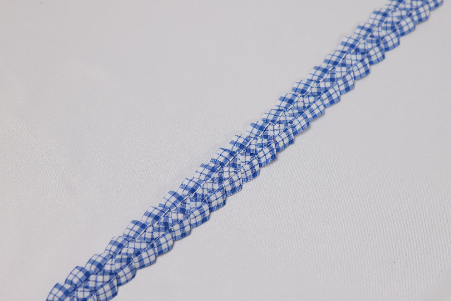 Patchy - White Pleated Mini Skirt with Blue and White Plaid Twisted Strap